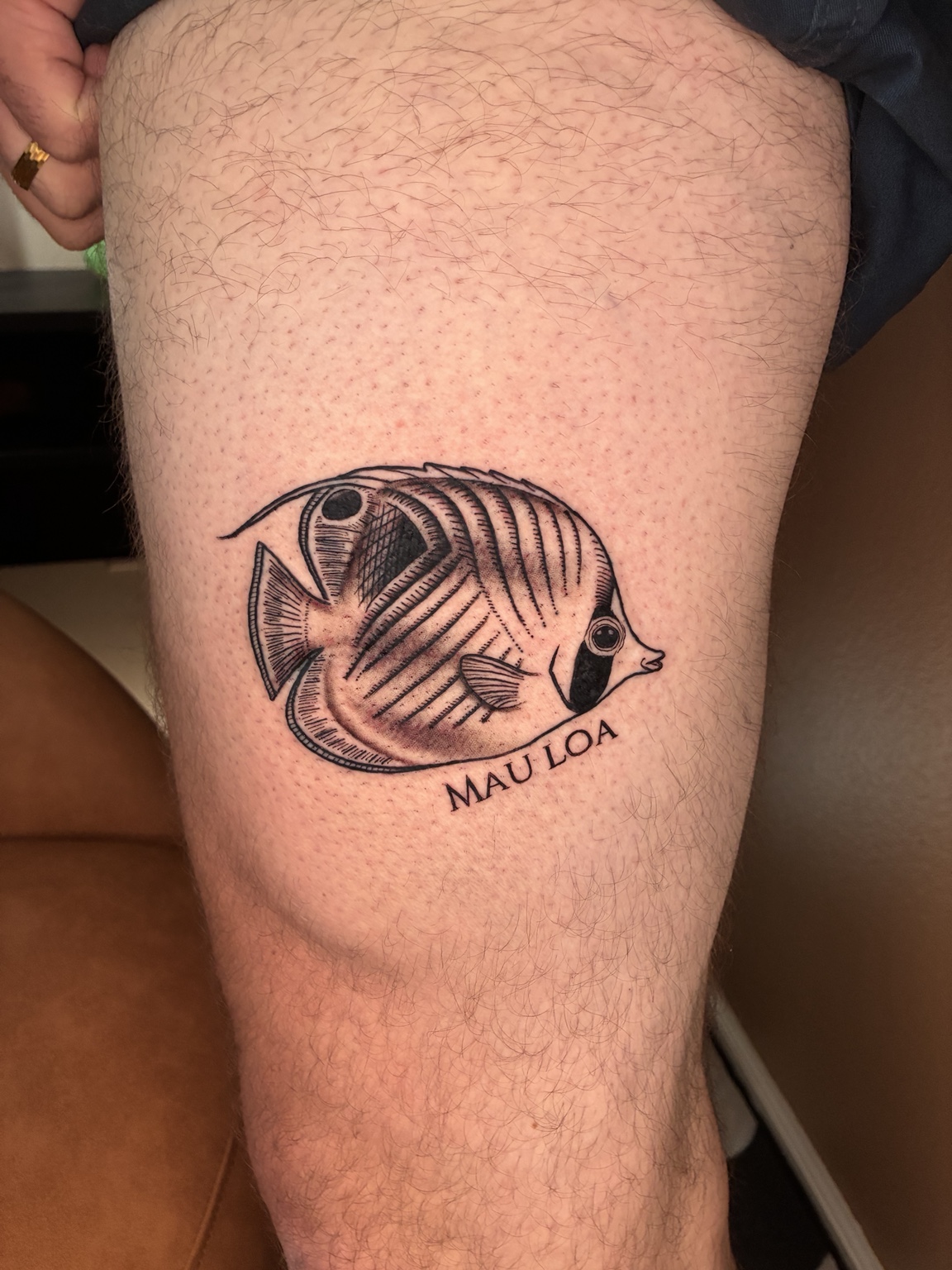 Fine-line tropical fish tattoo by Jen