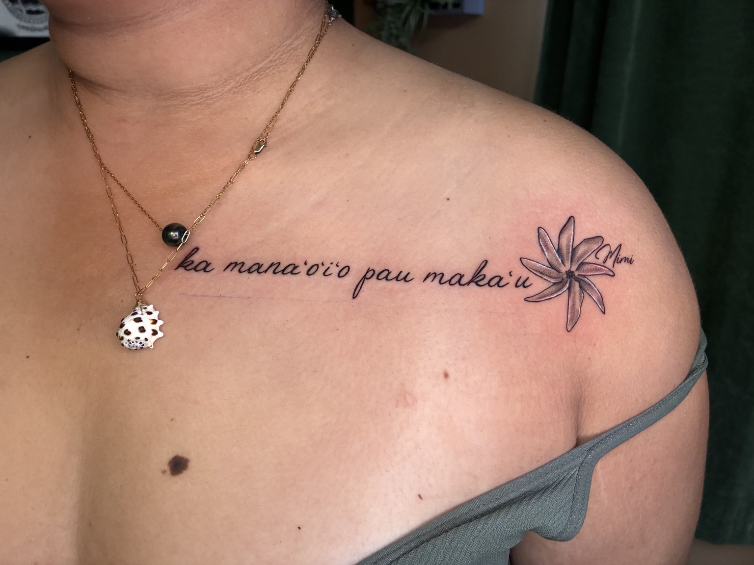 Delicate script and flower tattoo by Jen