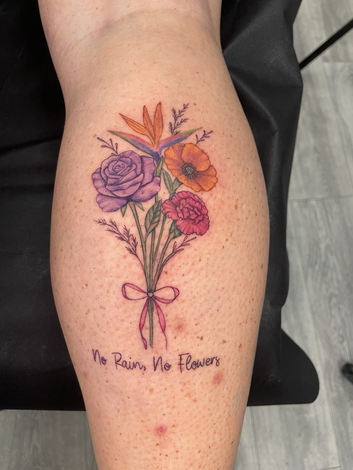 Color flower bouquet tattoo by Jen