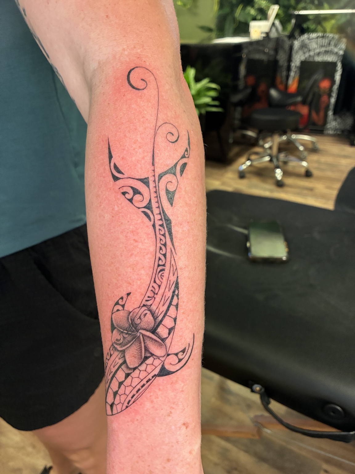 Polynesian floral forearm tattoo by Jen