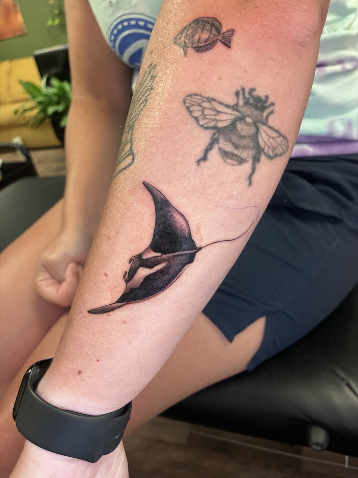 Manta ray and bee tattoo by Jen